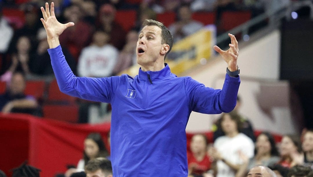 Duke head coach Jon Scheyer reacts from the sideline against North Carolina State during the first half of an NCAA college basketball game in Raleigh, N.C., Monday, March 4, 2024.