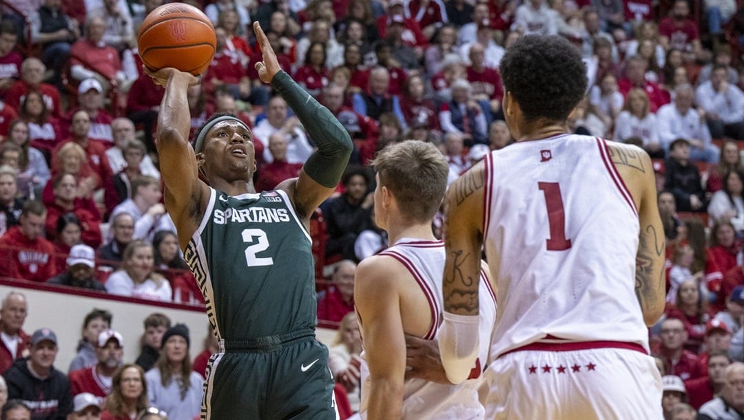 Michigan State guard Tyson Walker (2) shoots during an NCAA college basketball game against Indiana, Sunday, March 10, 2024, in Bloomington, Ind.