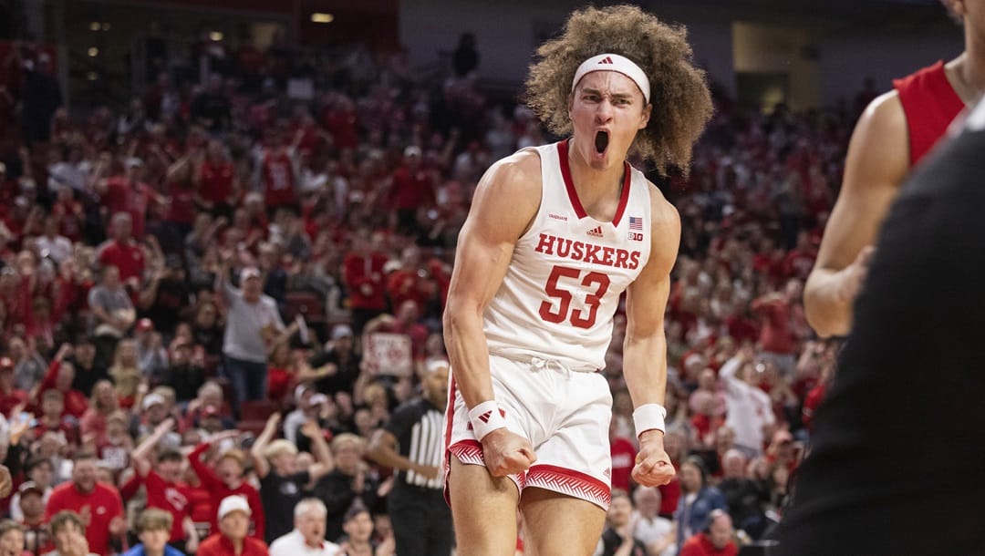 Nebraska's Josiah Allick celebrates after dunking against Rutgers during the first half of an NCAA college basketball game, Sunday, March 3, 2024, in Lincoln, Neb.