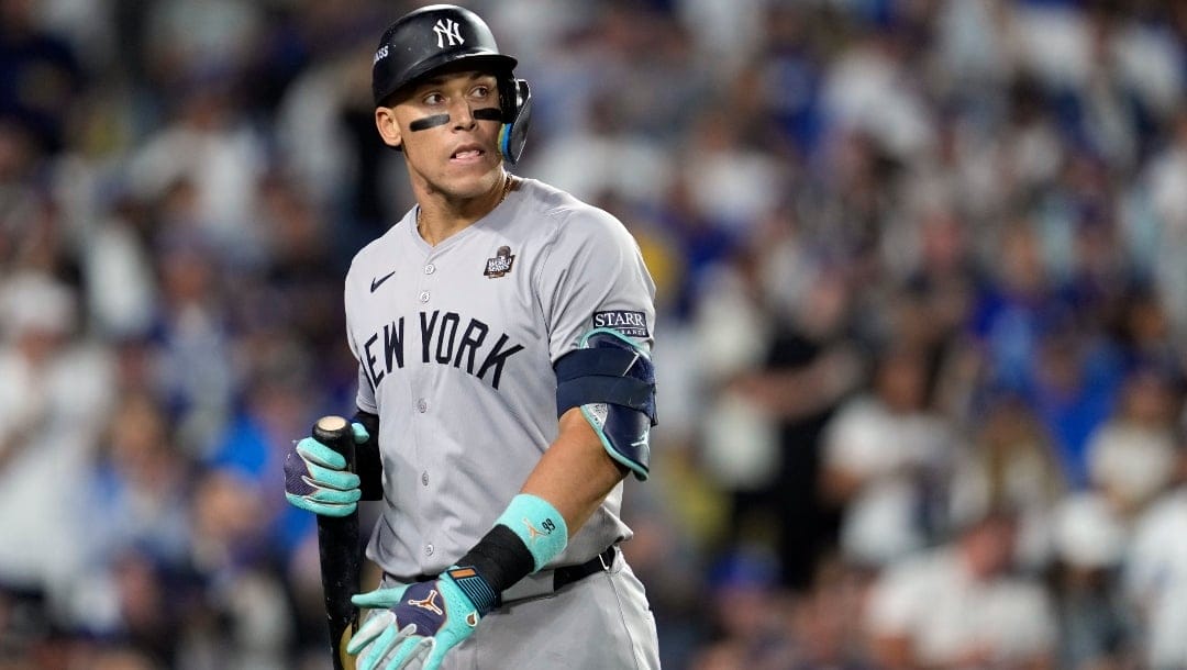 New York Yankees' Aaron Judge walks back to the dugout after striking out against the Los Angeles Dodgers during the ninth inning in Game 2 of the baseball World Series, Saturday, Oct. 26, 2024, in Los Angeles.