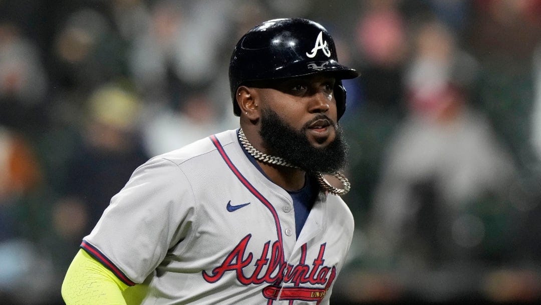 Atlanta Braves' Marcell Ozuna rounds the bases after hitting a solo home run during the ninth inning of a baseball game against the Chicago White Sox in Chicago, Tuesday, April 2, 2024. (AP Photo/Nam Y. Huh)