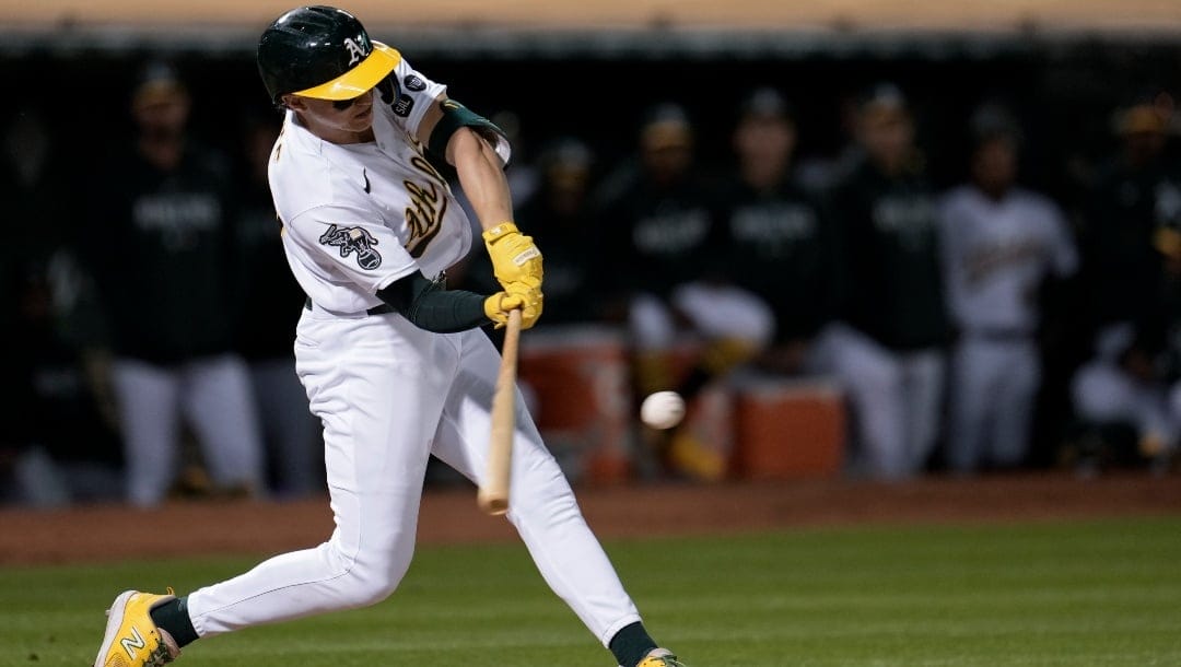 Oakland Athletics' Zack Gelof hits a two-run double against the Los Angeles Angels during the fourth inning of a baseball game Friday, Sept. 1, 2023, in Oakland, Calif.