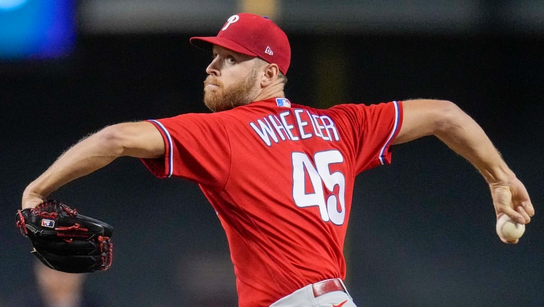 Philadelphia Phillies starting pitcher Zack Wheeler throws against the Arizona Diamondbacks during the fourth inning in Game 5 of the baseball NL Championship Series in Phoenix, Saturday, Oct. 21, 2023. (AP Photo/Ross D. Franklin)