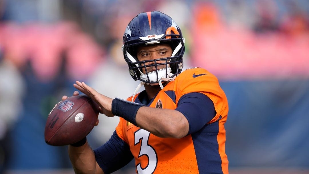 Denver Broncos quarterback Russell Wilson (3) before an NFL football game in Empower Field at Mile High Sunday, Dec. 31, 2023, in Denver. (AP Photo/David Zalubowski)