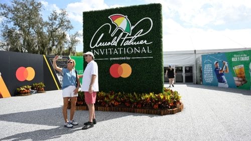 Spectators make a selfie photo during the second round of the Arnold Palmer Invitational golf tournament, Friday, March 8, 2024, in Orlando, Fla.