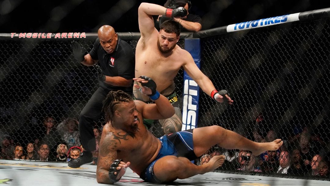 Tai Tuivasa, top, fights Greg Hardy during a UFC 264 heavyweight mixed martial arts bout Saturday, July 10, 2021, in Las Vegas.