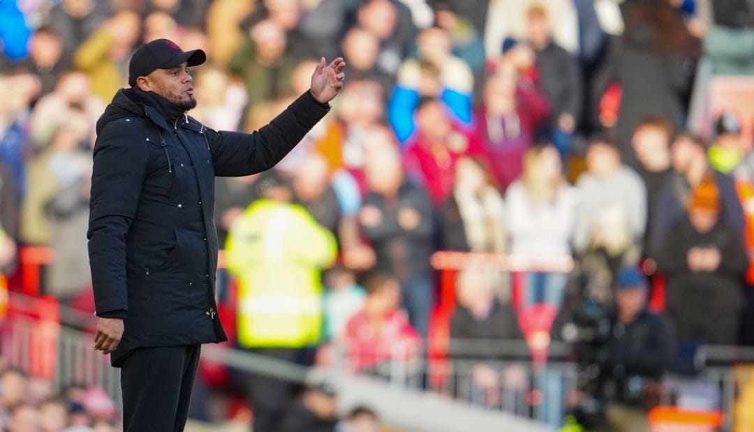Burnley's head coach Vincent Kompany gives instructions to his players during the English Premier League soccer match between Liverpool and Burnley, at Anfield stadium in Liverpool, England, Saturday, Feb. 10, 2024.