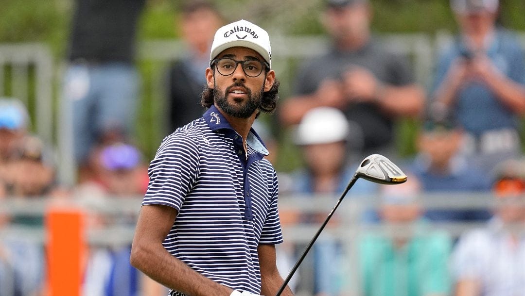 Akshay Bhatia watches his drive on the first hole during the final round of the Texas Open golf tournament, Sunday, April 7, 2024, in San Antonio.