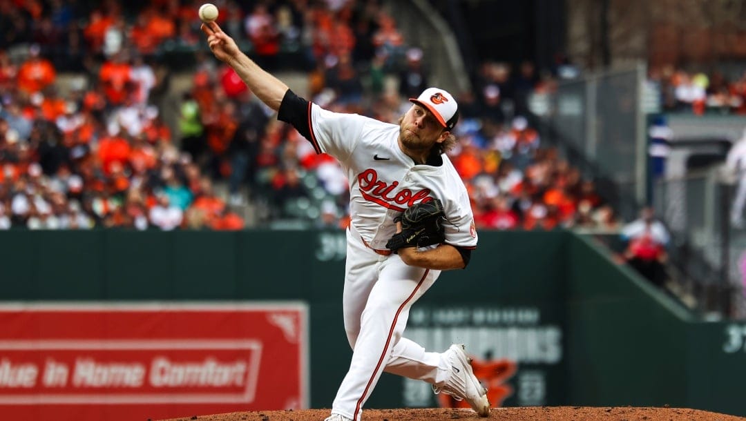 Orioles starting pitcher Corbin Burnes (39) throws during the second inning of a baseball game against the Los Angeles Angels, Thursday, March 28, 2024, in Baltimore.