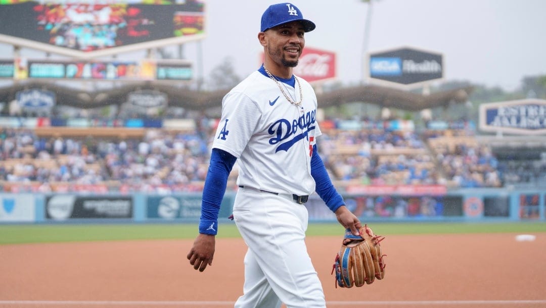 Los Angeles Dodgers shortstop Mookie Betts (50) walks on the field during a baseball game against the San Diego Padres Sunday, April 14, 2024, in Los Angeles.