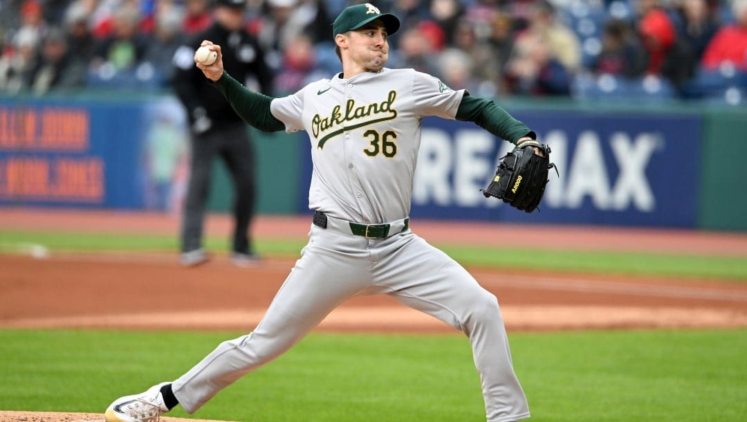 Oakland Athletics starting pitcher Ross Stripling delivers during the first inning of a baseball game against the Cleveland Guardians, Sunday, April 21, 2024, in Cleveland.