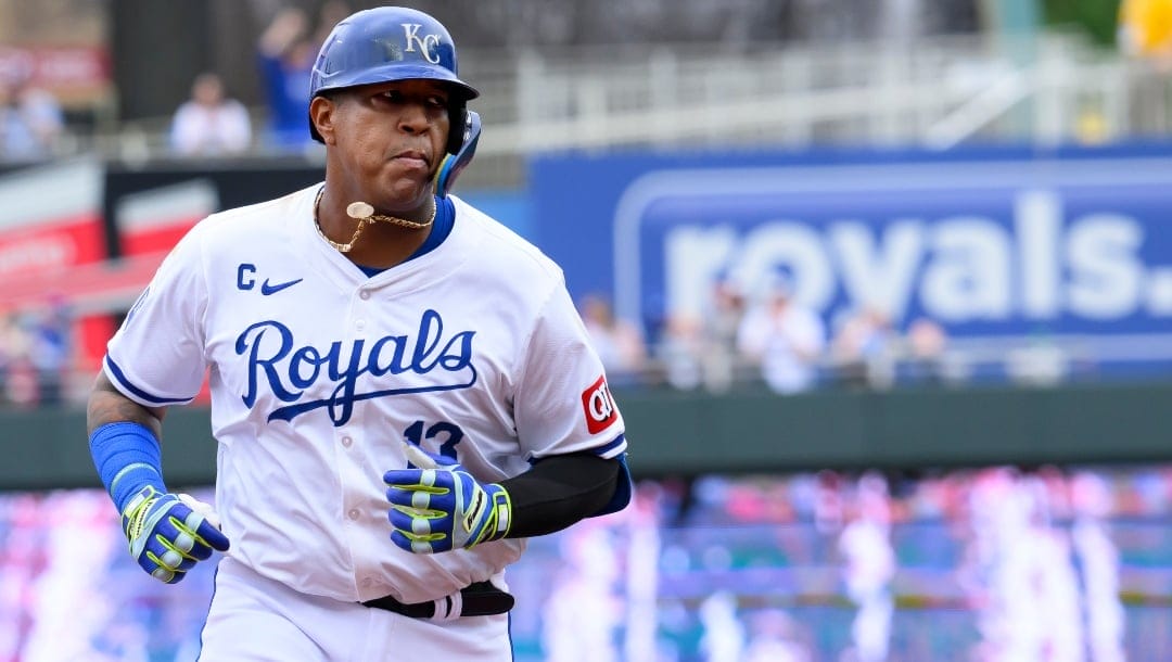 Kansas City Royals' Salvador Perez runs the bases after hitting a home run during the first inning of a baseball game against the Minnesota Twins, Sunday, March 31, 2024, in Kansas City, Mo.