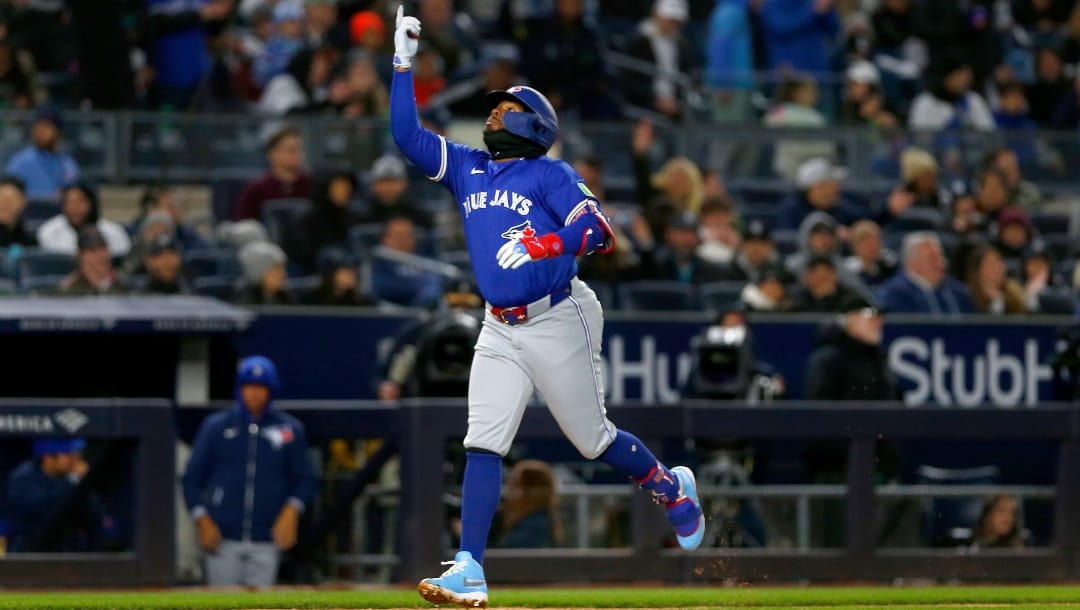 Toronto Blue Jays' Vladimir Guerrero Jr. runs the bases after hitting a solo home run against the New York Yankees during the seventh inning of a baseball game Saturday, April 6, 2024, in New York.