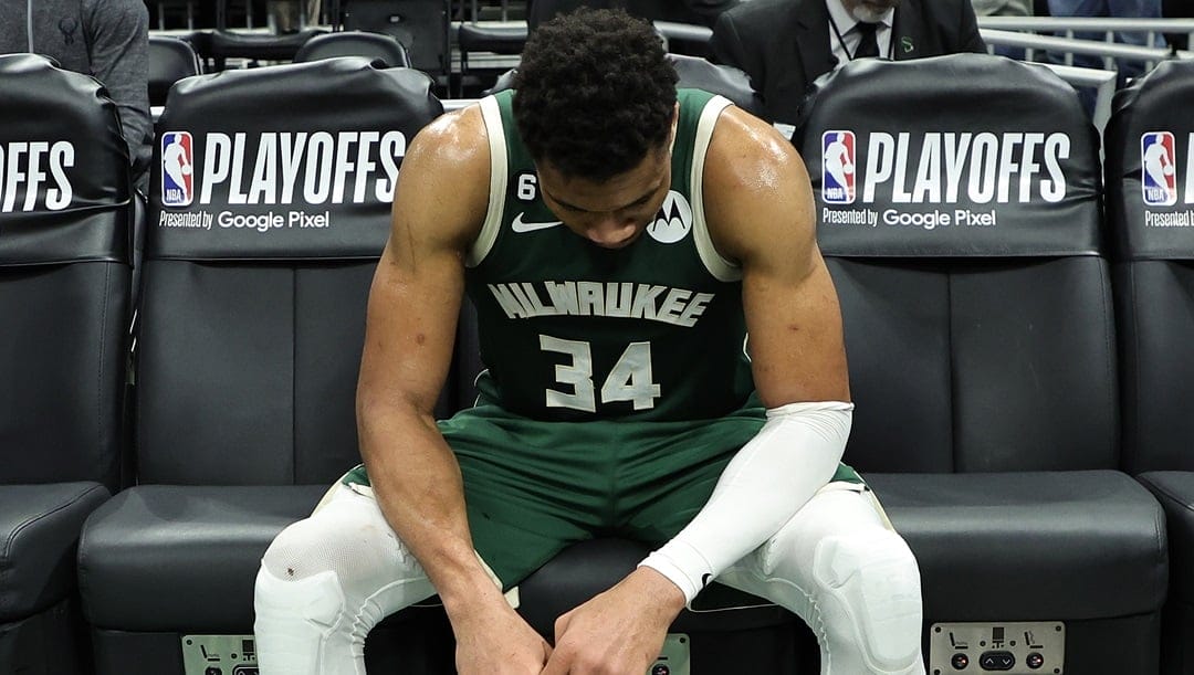 Giannis Antetokounmpo #34 of the Milwaukee Bucks sits on the bench after losing Game 5 of the Eastern Conference First Round Playoffs against the Miami Heat in overtime at Fiserv Forum on April 26, 2023 in Milwaukee, Wisconsin.