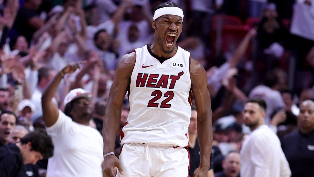 Jimmy Butler #22 of the Miami Heat reacts during the fourth quarter against the Milwaukee Bucks in Game Four of the Eastern Conference First Round Playoffs at Kaseya Center on April 24, 2023 in Miami, Florida.