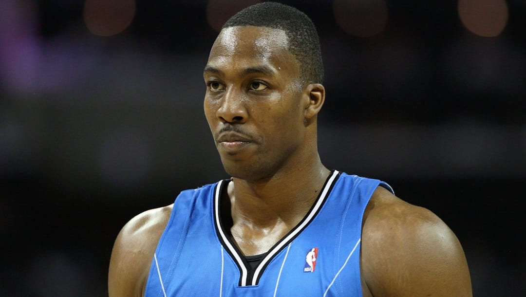 Center Dwight Howard #12 of the Orlando Magic collects himself before a free throw attempt during Game Three of the Eastern Conference Quarterfinals against the Charlotte Bobcats during the 2010 NBA Playoffs at Time Warner Cable Arena on April 24, 2010 in Charlotte, North Carolina.