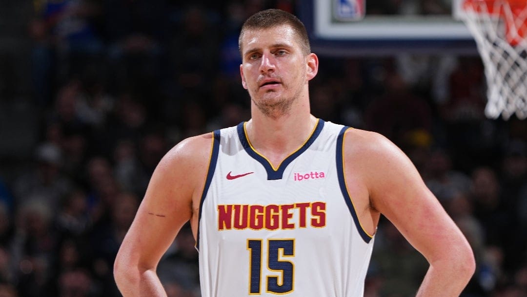 DENVER, CO - FEBRUARY 28: Nikola Jokic #15 of the Denver Nuggets looks on during the game against the Sacramento Kings on February 28, 2024 at the Ball Arena in Denver, Colorado. NOTE TO USER: User expressly acknowledges and agrees that, by downloading and/or using this Photograph, user is consenting to the terms and conditions of the Getty Images License Agreement. Mandatory Copyright Notice: Copyright 2024 NBAE