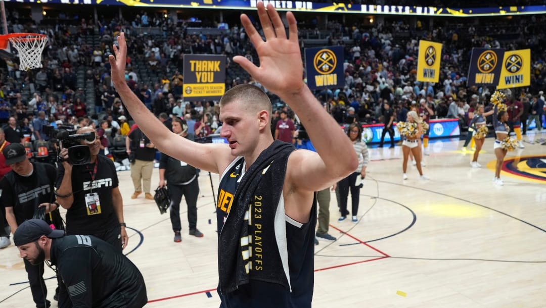 Denver Nuggets center Nikola Jokic (15) acknowledges the crowd after Game 2 of the NBA basketball Western Conference Finals series against the Los Angeles Lakers, Thursday, May 18, 2023, in Denver. The Nuggets defeated the Lakers 108-103.