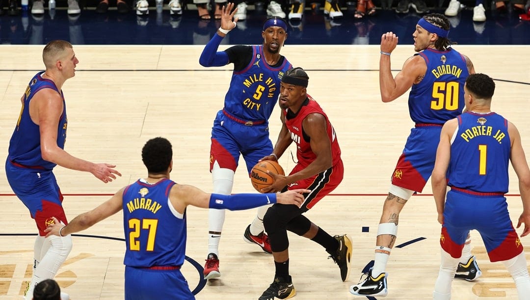 Jimmy Butler #22 of the Miami Heat drives to the basket during the first quarter against the Denver Nuggets in Game One of the 2023 NBA Finals at Ball Arena on June 01, 2023 in Denver, Colorado.