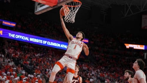 Clemson guard Chase Hunter (1) shoots as Virginia Tech guard Jaden Schutt (2) watches during the second half of an NCAA college basketball game Saturday, March 8, 2025, in Clemson, S.C.