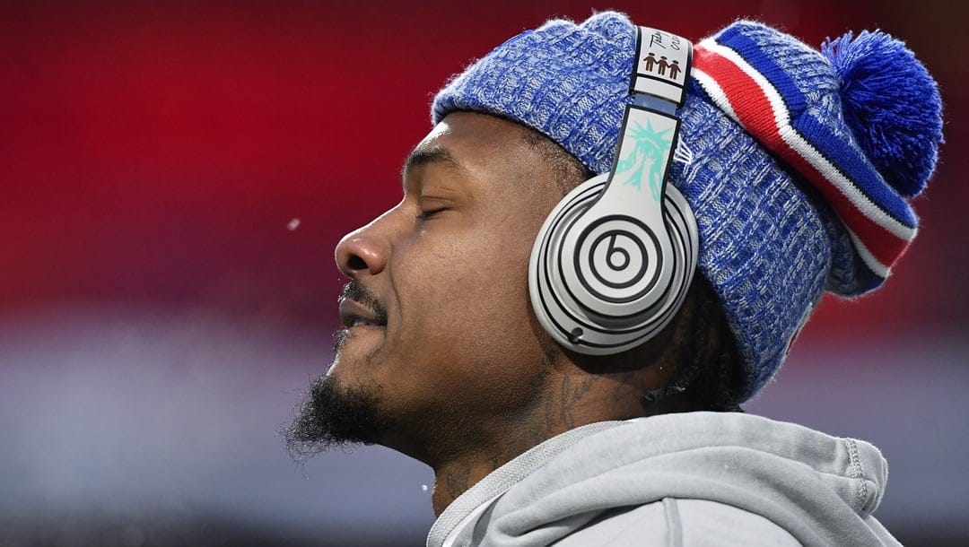 Buffalo Bills wide receiver Stefon Diggs warms up before playing against the Kansas City Chiefs in an NFL AFC division playoff football game in Orchard Park, N.Y., Sunday, Jan. 21, 2024.