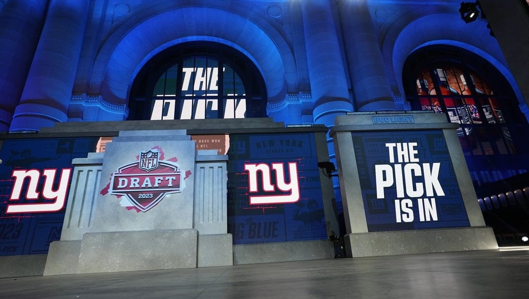 The onstage video screens display "The Pick Is In" for the New York Giants during the 2023 NFL Draft, Thursday, April 27, 2023, in Kansas City, Mo.