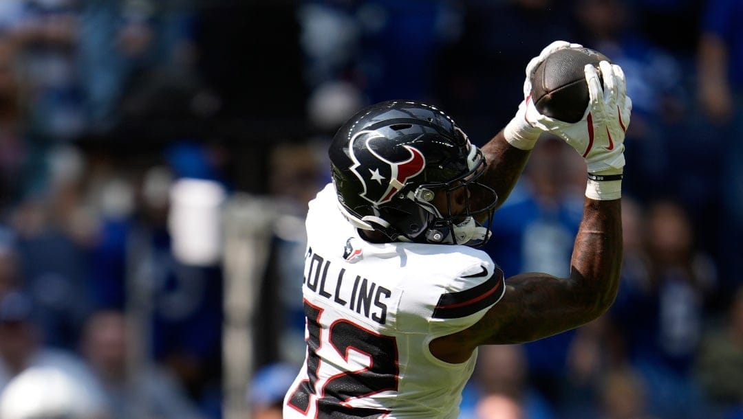 Houston Texans wide receiver Nico Collins (12) makes a catch during the second half of an NFL football game against the Indianapolis Colts, Sunday, Sept. 8, 2024, in Indianapolis. (AP Photo/Michael Conroy)