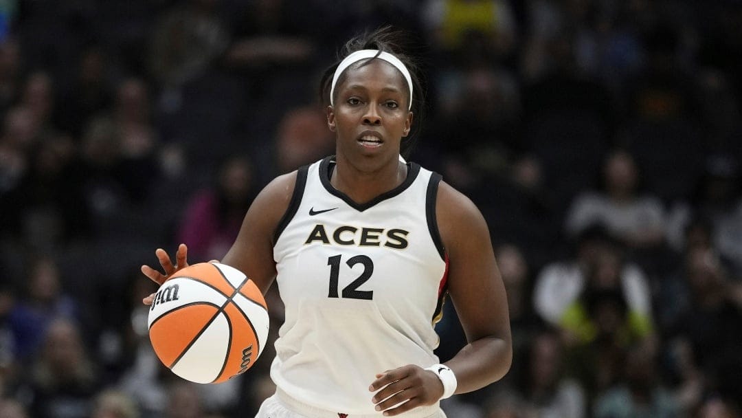 Las Vegas Aces guard Chelsea Gray (12) in action against the Seattle Storm during the second half of a WNBA basketball game Saturday, May 20, 2023, in Seattle.