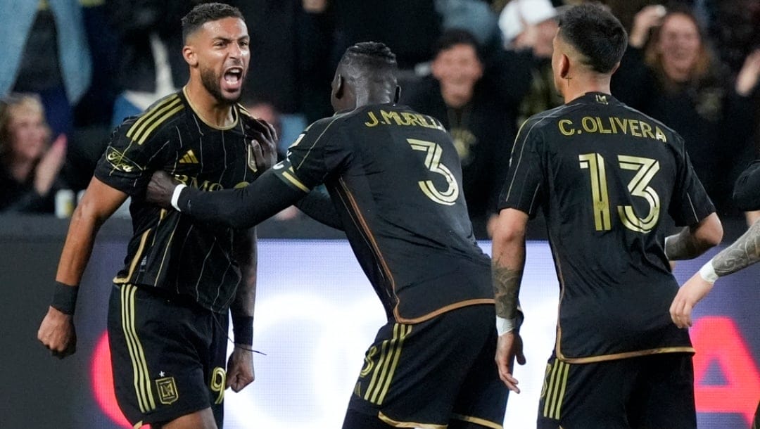 Los Angeles FC forward Denis Bouanga, left, celebrates his goal against the Portland Timbers with Jesus Murillo (3) and Cristian Olivera (13) during the second half of an MLS soccer match Saturday, April 27, 2024, in Los Angeles.