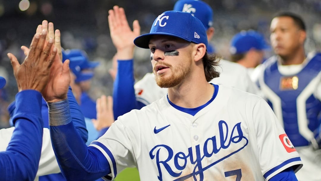 Kansas City Royals' Bobby Witt Jr. celebrates with teammates after their baseball game against the Toronto Blue Jays Tuesday, April 23, 2024, in Kansas City, Mo. The Royals won 3-2. (AP Photo/Charlie Riedel)