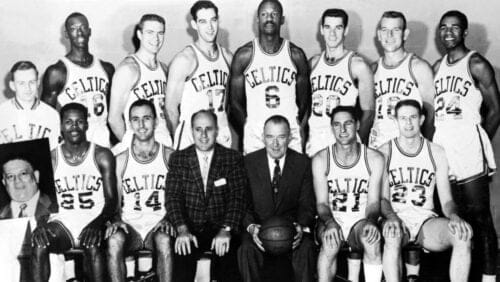 The World Champions of basketball Boston Celtics pose for a team portrait seated (L-R): K. C. Jones, Bob Cousy, coach Red Auerbach, President Walter A. Brown, Bill Sharman, Frank Ramsey. Standing: Trainer Buddy LeRoux, Tom Sanders, Tom Heinsohn, Gene Conley, Bill Russell, Gene Guarillia, Jim Loscutoff, Sam Jones, inset treasurer Lou. in Boston, Massachusetts in 1961.