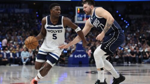 Anthony Edwards #5 of the Minnesota Timberwolves is defended by Luka Doncic #77 of the Dallas Mavericks during the third quarter in Game Four of the Western Conference Finals at American Airlines Center on May 28, 2024 in Dallas, Texas.