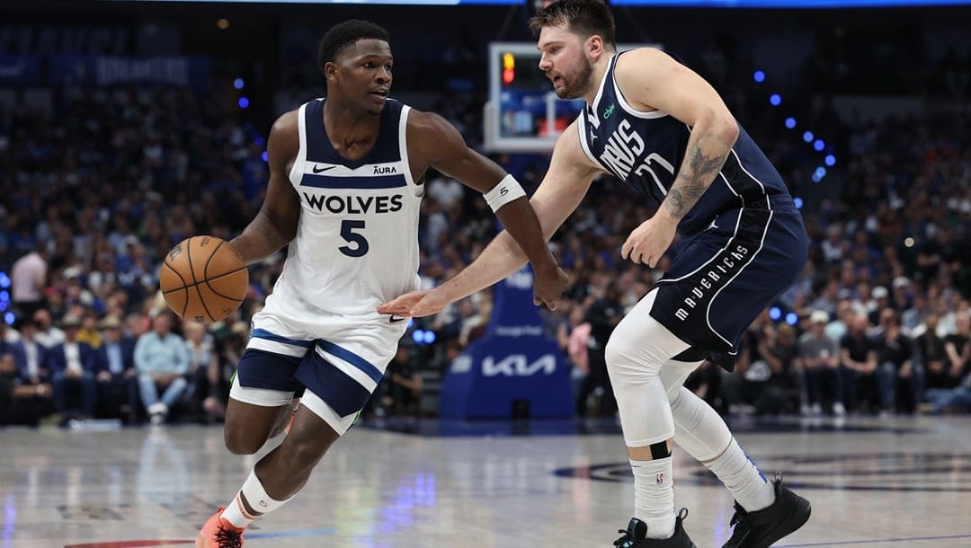 DALLAS, TEXAS - MAY 28: Anthony Edwards #5 of the Minnesota Timberwolves is defended by Luka Doncic #77 of the Dallas Mavericks during the third quarter in Game Four of the Western Conference Finals at American Airlines Center on May 28, 2024 in Dallas, Texas.
