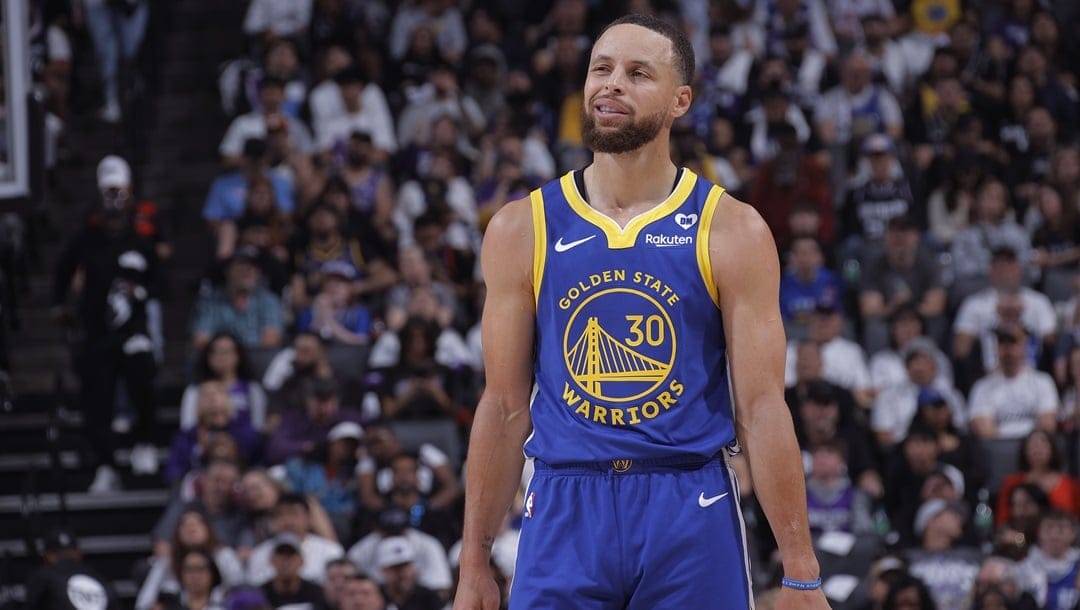 SACRAMENTO, CA - APRIL 16: Stephen Curry #30 of the Golden State Warriors looks on during the game against the Sacramento Kings during the 2024 Play-In Tournament on April 16, 2024 at Golden 1 Center in Sacramento, California.