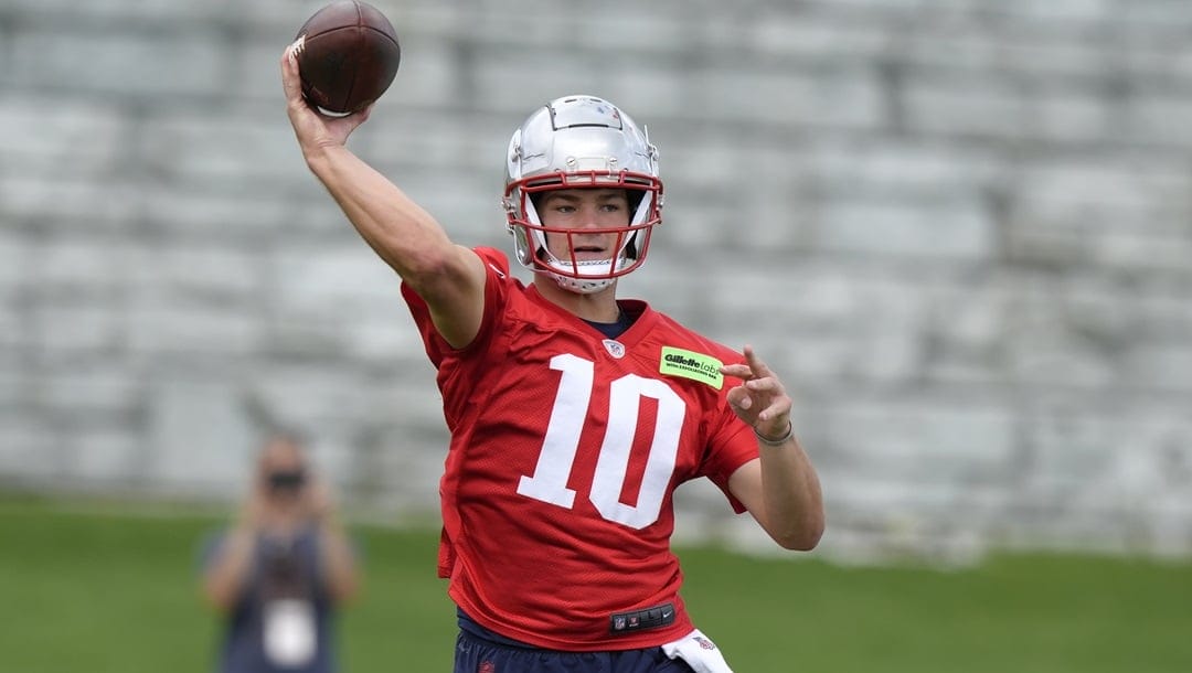 New England Patriots quarterback Drake Maye (10) passes during an NFL football practice, Wednesday, May 29, 2024, in Foxborough, Mass.