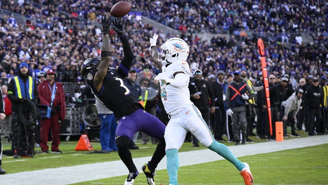 Baltimore Ravens wide receiver Odell Beckham Jr. (3) catches a pass as Miami Dolphins cornerback Kader Kohou (4) defends during the first half of an NFL football game in Baltimore, Sunday, Dec. 31, 2023. The Miami Dolphins agreed to sign wide receiver Odell Beckham Jr. to a one-year contract, a person with knowledge of the deal told The Associated Press on Friday, May 3, 2024.