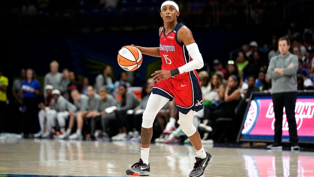 Washington Mystics guard Brittney Sykes handles the ball during a WNBA basketball game against the Dallas Wings, Friday, July 28, 2023, in Arlington, Texas.