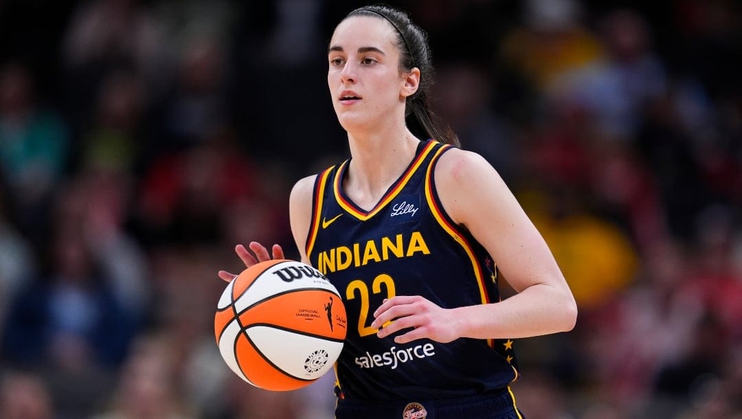 Indiana Fever's Caitlin Clark dribbles during the second half of an WNBA preseason basketball game against the Atlanta Dream, Thursday, May 9, 2024, in Indianapolis.