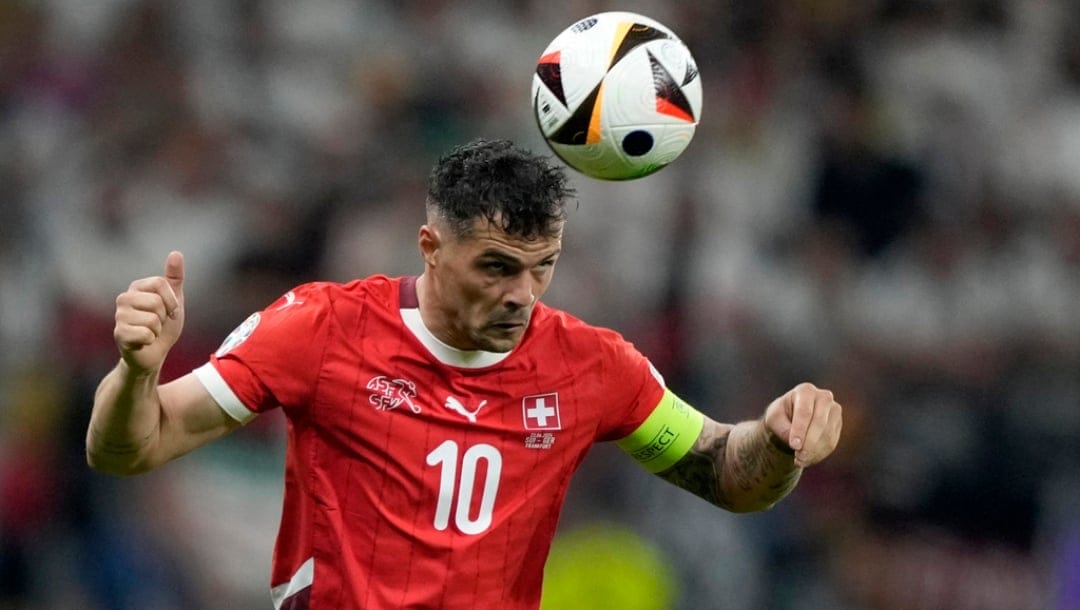 Switzerland's Granit Xhaka heads the ball during a Group A match between Switzerland and Germany at the Euro 2024 soccer tournament in Frankfurt, Germany, Sunday, June 23, 2024.