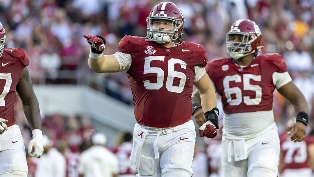 Alabama center Seth McLaughlin (56) takes the field against Tennessee during the second half of an NCAA college football game, Saturday, Oct. 21, 2023, in Tuscaloosa, Ala. Alabama center Seth McLaughlin, who had several errant snaps against Michigan in the College Football Playoffs, has entered the transfer portal, Wednesday, Jan. 3, 2024.