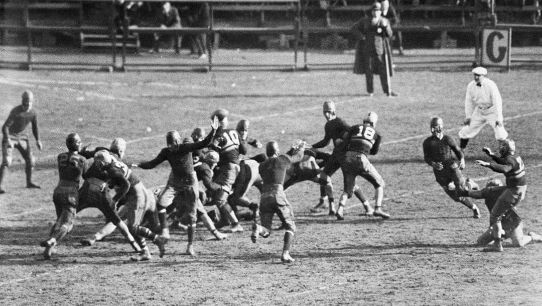 Brown, the Army right half back, photographed as he place-kicked a field goal in the early part of the second period of the Army-Navy game, Dec. 12, 1931, New York. An off-tackle play brought the ball into position and Brown dropped back to his 15-yard-line and booted the ball over neatly. The Army held the lead 10 to 0 at the end of the first half of the Charity game.