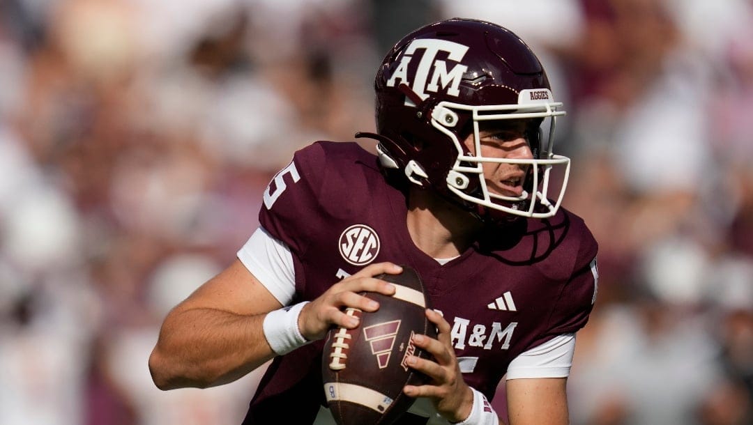 Texas A&M quarterback Conner Weigman (15) looks to pass against Louisiana-Monroe during the second quarter of an NCAA college football game Saturday, Sept. 16, 2023, in College Station, Texas. (AP Photo/Sam Craft)