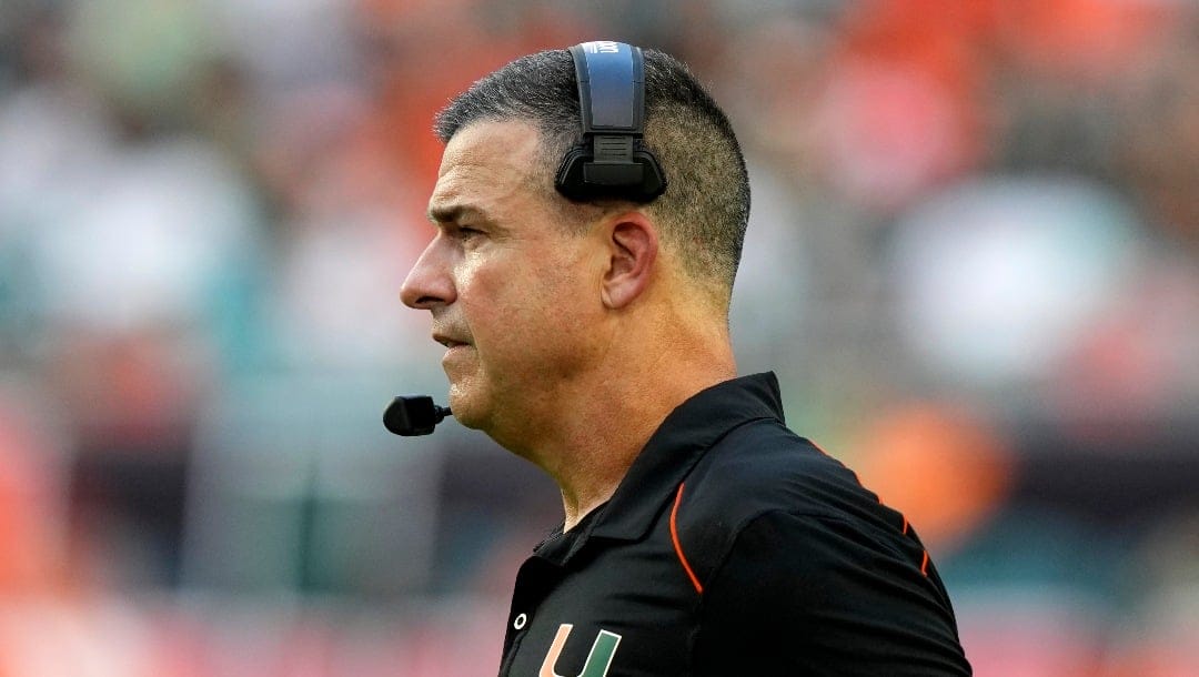 Miami head coach Mario Cristobal watches during the second half of an NCAA college football game against Virginia, Saturday, Oct. 28, 2023, in Miami Gardens, Fla. (AP Photo/Lynne Sladky)