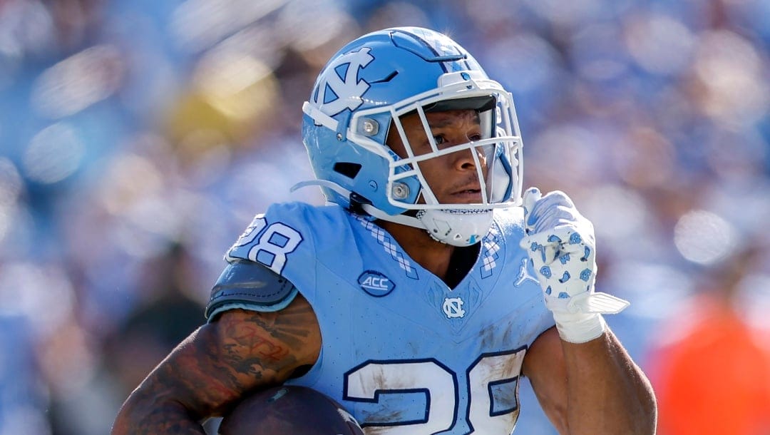 North Carolina running back Omarion Hampton runs for a touchdown in the first half of an NCAA college football game against Campbell in Chapel Hill, N.C., Saturday, Nov. 4, 2023. (AP Photo/Nell Redmond)