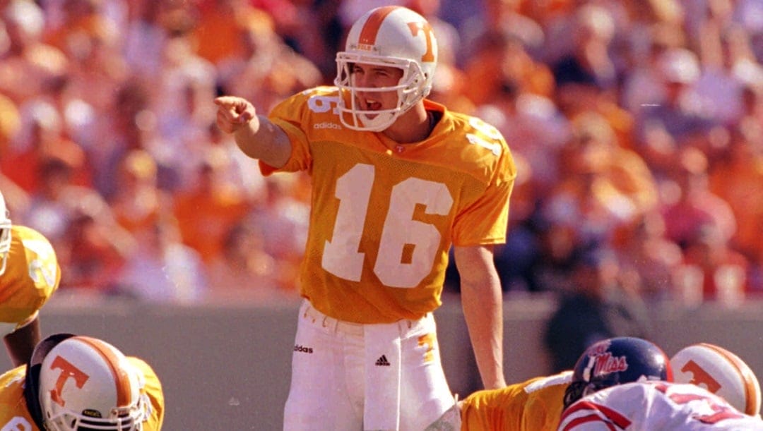 Tennessee quarterback Peyton Manning (16) directs a play during their 31-17 win over Ole Miss on Saturday, Oct. 4, 1997 in Knoxville, Tenn. Manning threw for 324 yards and two touchdowns.