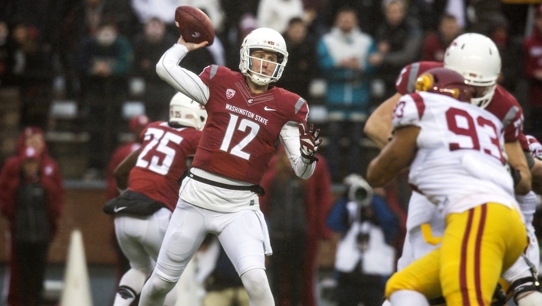 Washington State quarterback Connor Halliday (12) attempts a pass during the first quarter of an NCAA college football game against Southern California on Saturday, Nov. 1, 2014, at Martin Stadium in Pullman, Wash. Southern California won 44-17.