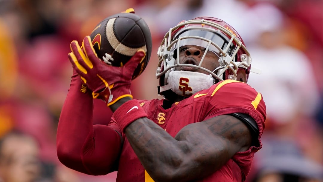 Southern California wide receiver Zachariah Branch catches a ball thrown by quarterback Caleb Williams for a touchdown during the first half of an NCAA college football game against Nevada, Saturday, Sept. 2, 2023, in Los Angeles. (AP Photo/Ryan Sun)