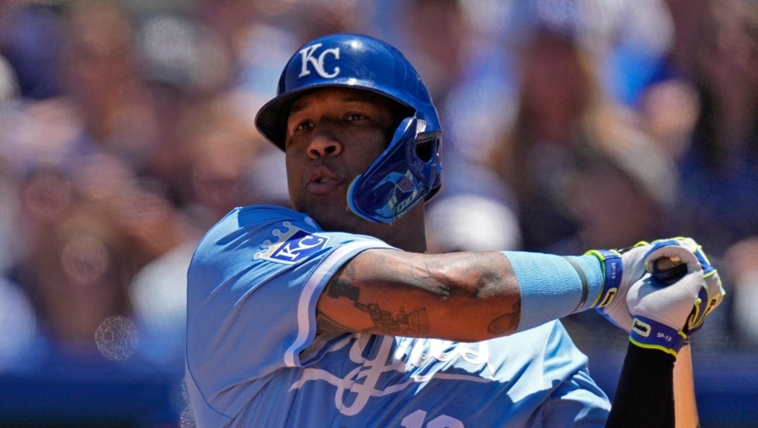 Kansas City Royals' Salvador Perez bats during the first inning of a baseball game against the Seattle Mariners Sunday, June 9, 2024, in Kansas City, Mo. (AP Photo/Charlie Riedel)
