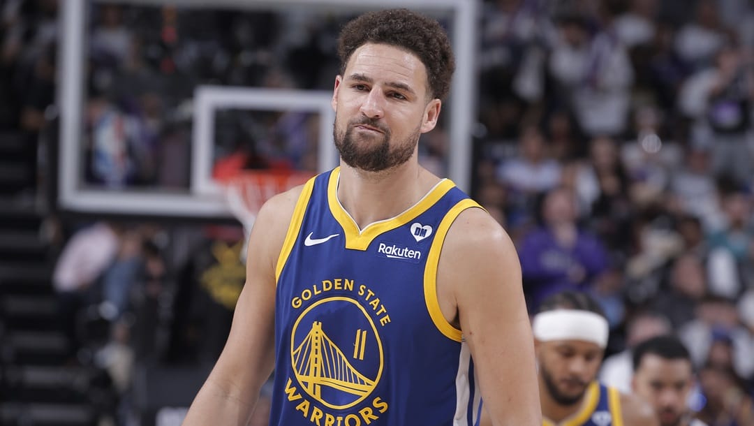 SACRAMENTO, CA - APRIL 16: Klay Thompson #11 of the Golden State Warriors looks on during the game against the Sacramento Kings during the 2024 Play-In Tournament on April 16, 2024 at Golden 1 Center in Sacramento, California.