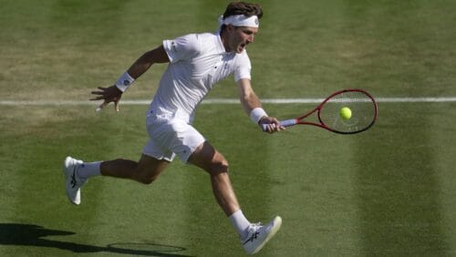 Britain's Liam Broady returns to Canada's Denis Shapovalov in a men's singles match on day five of the Wimbledon tennis championships in London, Friday, July 7, 2023.